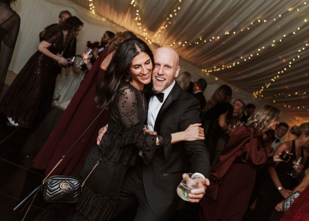 Guests enjoying their time at their friends wedding in Essex